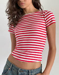 A fitted, short-sleeved crop top featuring horizontal red and white stripes and a wide boat neckline.